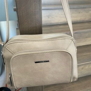 Sacoche neuve roots, jamais utilisée